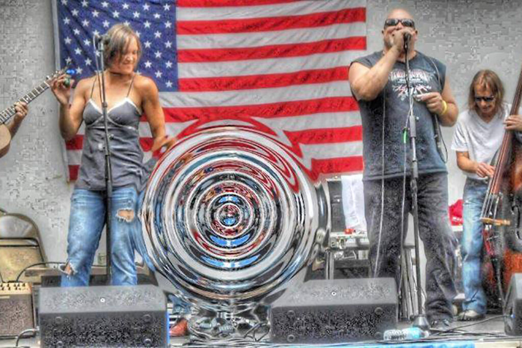 James Supra and Sarah Ayers performing on stage