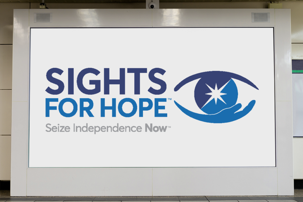The Sights for Hope logo on a large white background on a wall