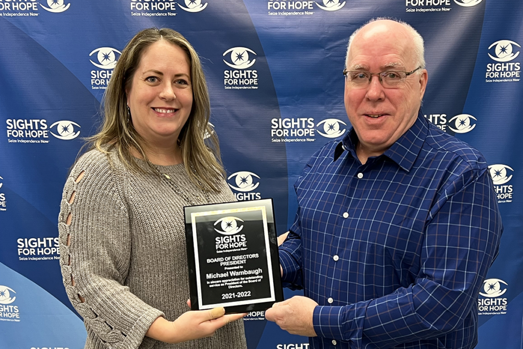 Plaque presentation to former Sights for Hope Board President Michael Wambaugh by Board President Kate Raymond